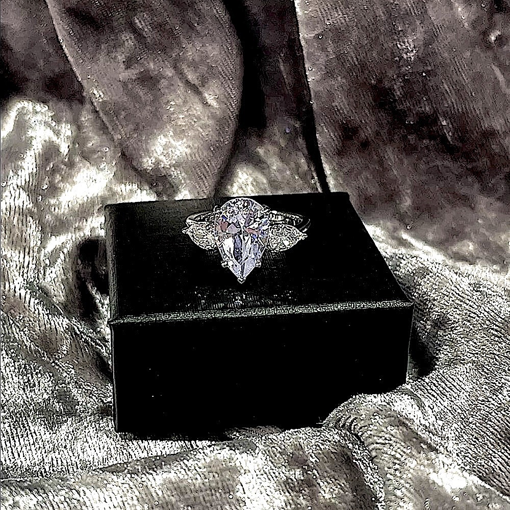 3ctw Pear Three Stone Ring in Sterling Silver White Sapphire - Picture 6 of 12